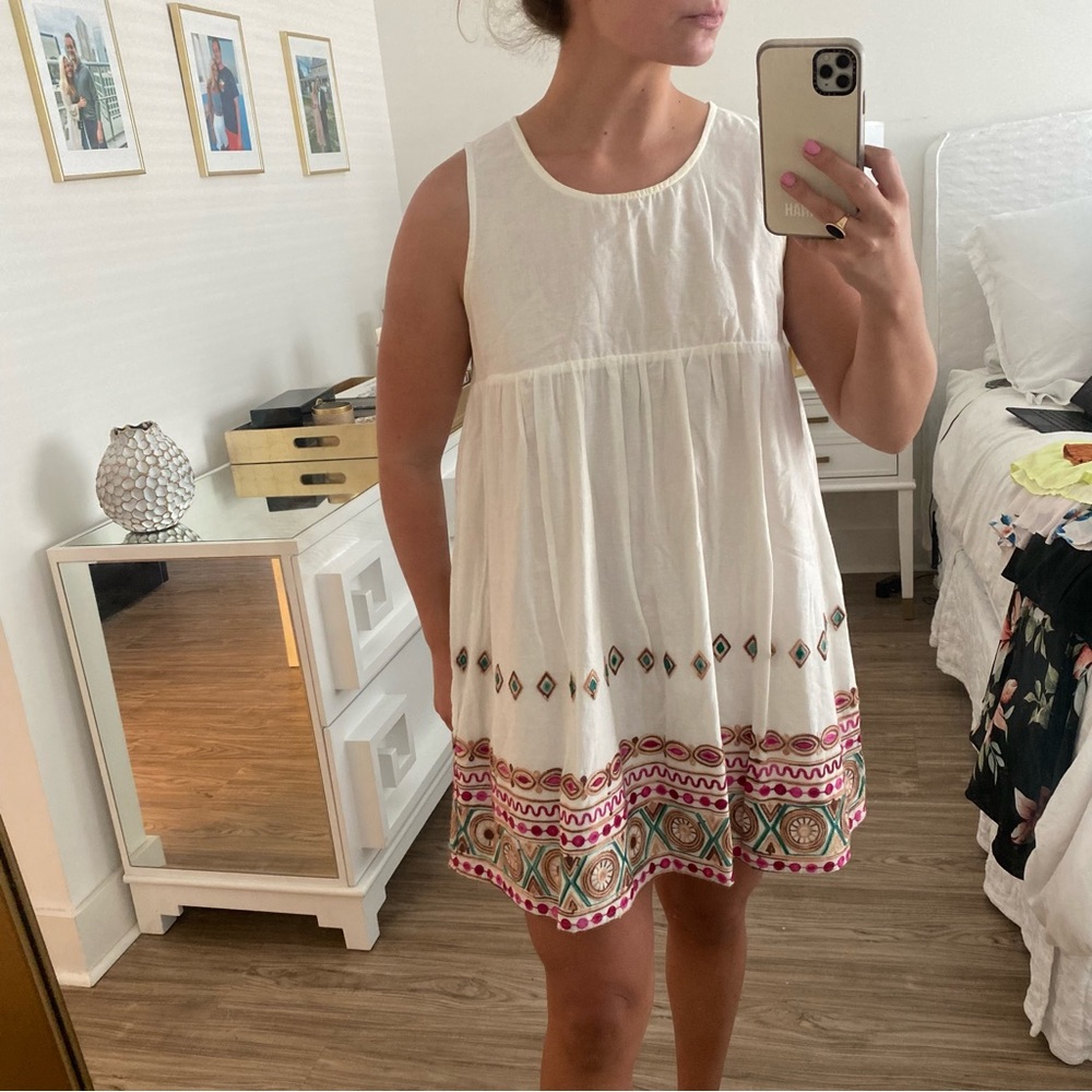 White sleeveless embroidered babydoll dress
